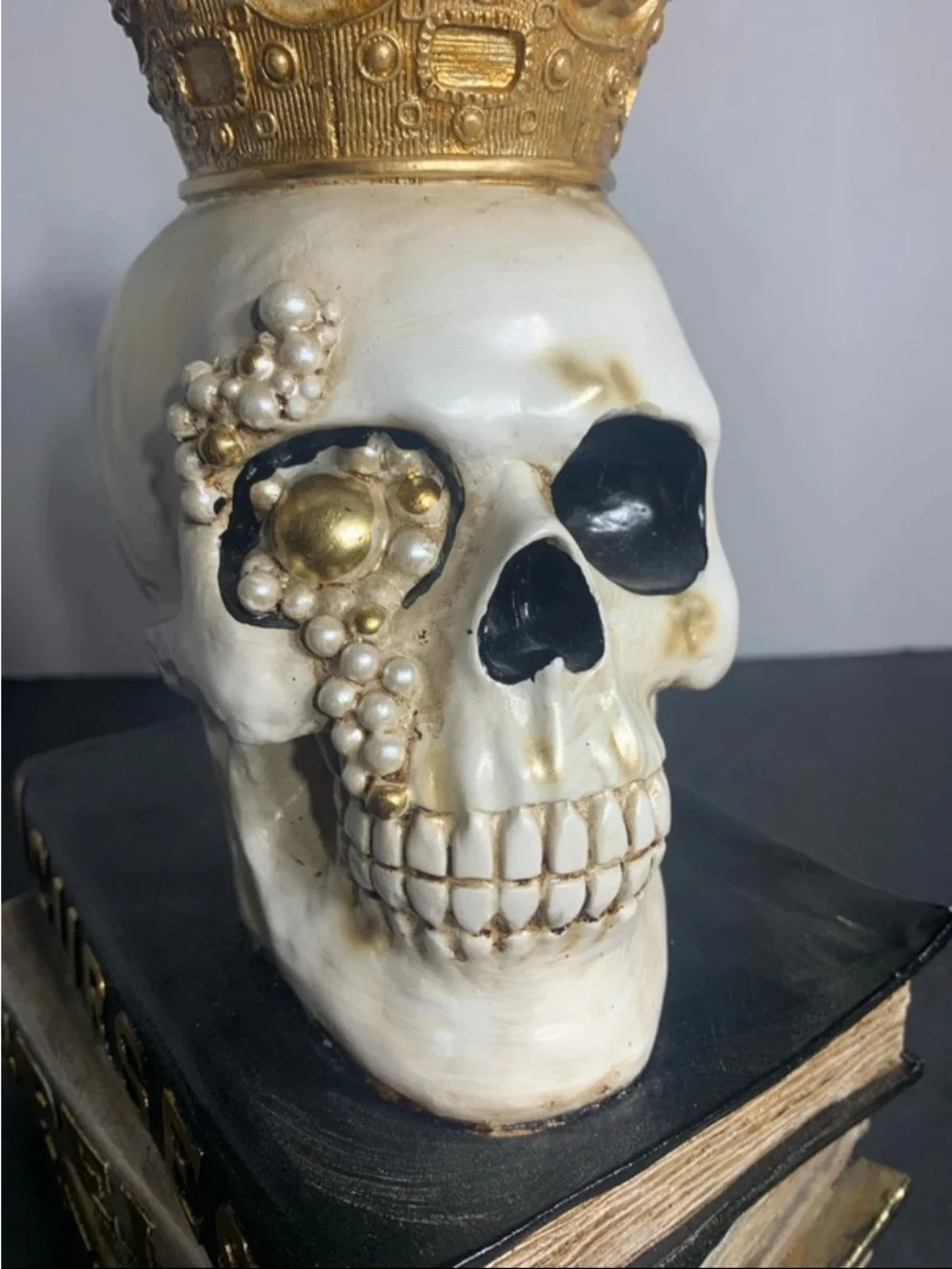 Decorative White and Gold Skull on Stacked Spell Books - Home Accent